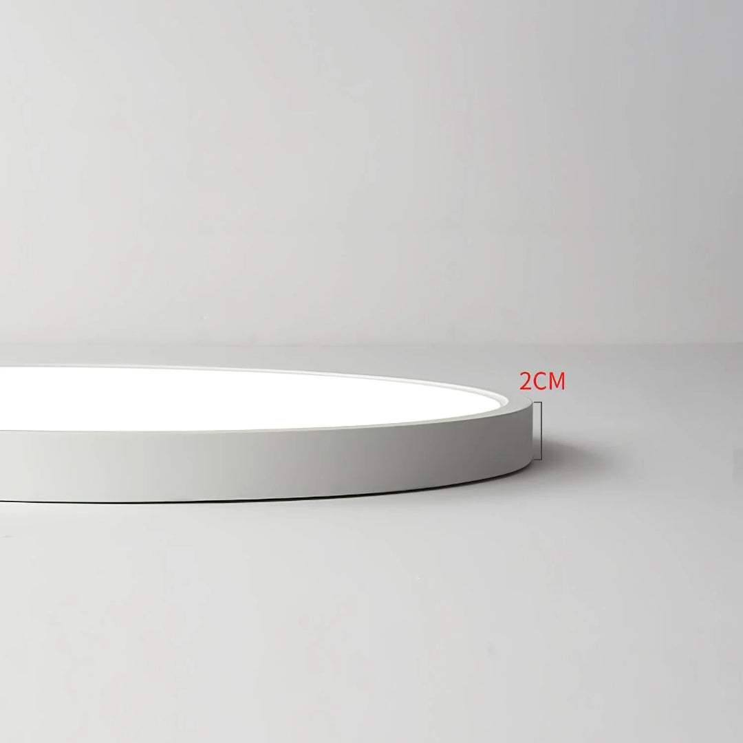 Minimalistyczna okrągła lampa sufitowa – widok produktu 5 | Nuvira Home